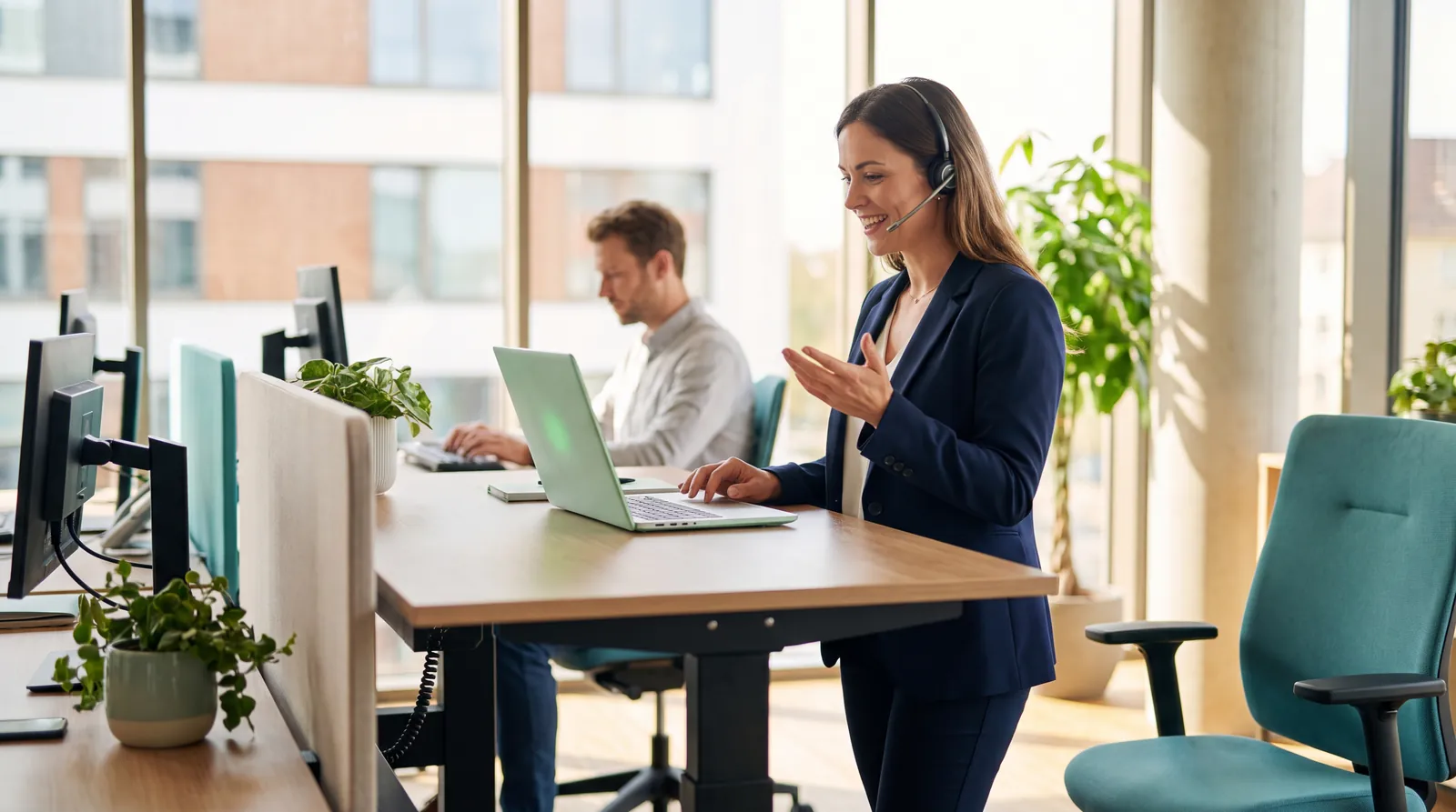 A saleswoman on a headset smiling as she reconnects with a dormant lead during a database reactivation campaign